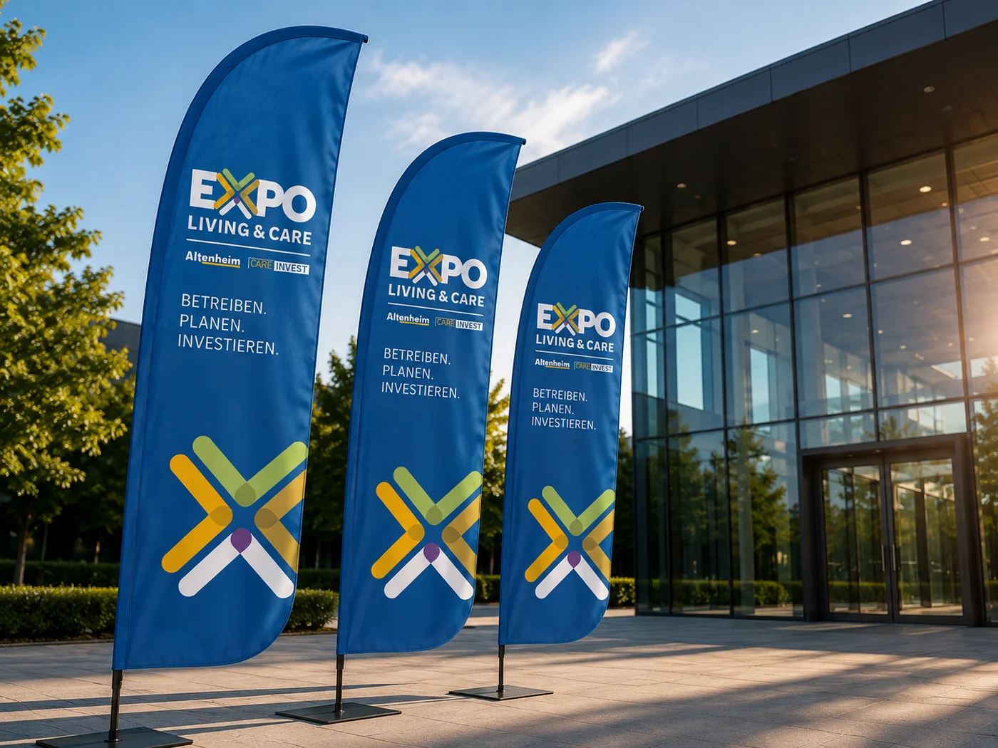 EXPO LIVING & CARE — beach flags outside the venue